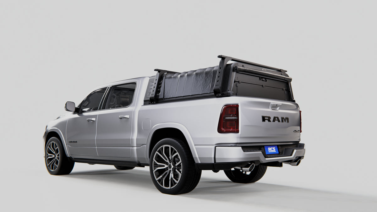 RCS canopy on a RAM 1500 with optional roof racks and rear security screen